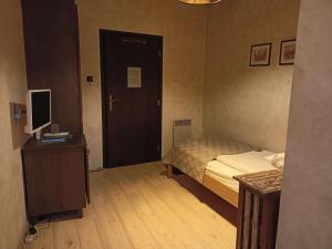Postel nebo postele na pokoji v ubytování Avalon Rooms