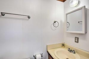 a bathroom with a sink and a mirror at Woodsy Blue Ridge Retreat, 3 Mi to Downtown! in Blue Ridge +24 photos