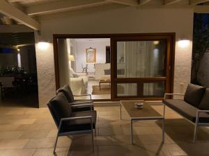 Posezení v ubytování VILLA 21 + 20 fotografií
