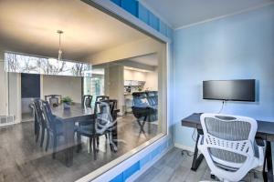 a dining room with a table and chairs at Movie Room and Private Pool Richardson Retreat in Richardson