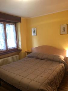 Postel nebo postele na pokoji v ubytování Ca del Nore