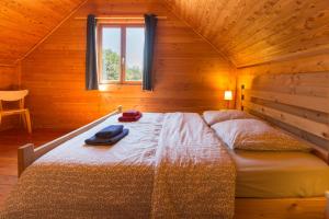 Postel nebo postele na pokoji v ubytování Le Bois de Faral + 35 fotografií
