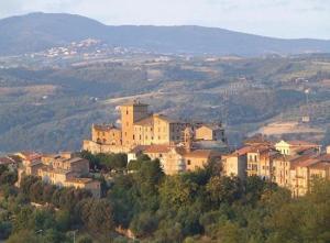 a group of buildings on top of a mountain at La Bomboniera di Marco in Fabro