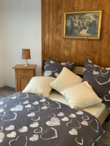 מיטה או מיטות בחדר ב-LOFT Ferienhaus Fischer