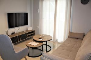 TV a/nebo společenská místnost v ubytování Khibra 2