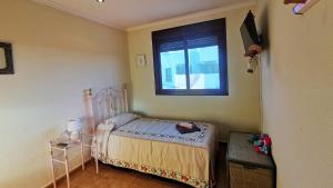 Łóżko lub łóżka w pokoju w obiekcie Sol y Alma Mediterranean Apartment