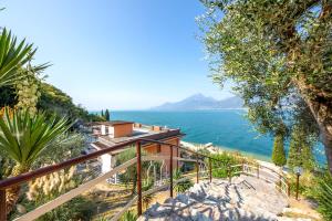 a view of the ocean from a house at Residence Castelli in Brenzone sul Garda