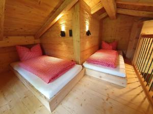 Postel nebo postele na pokoji v ubytování Der Anderlbauer am See + 82 fotografií