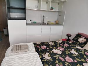 Krevet ili kreveti u jedinici u okviru objekta Divčibare Jezero apartman 25