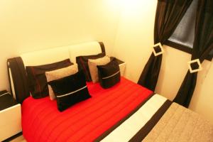 Uma cama ou camas num quarto em Alojamento Local S. Bartolomeu