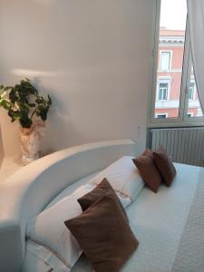 Posteľ alebo postele v izbe v ubytovaní Apartment Rome 18