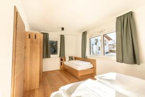 Posteľ alebo postele v izbe v ubytovaní LISAL Appartements