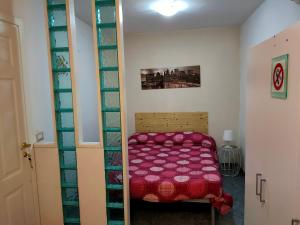 Postel nebo postele na pokoji v ubytování L'Attico