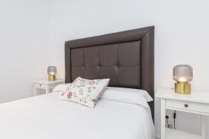 Postel nebo postele na pokoji v ubytování WintowinRentals Malaga Center, Comfortable and Renovated