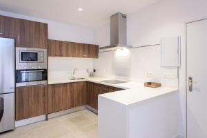 Kuchnia lub aneks kuchenny w obiekcie WintowinRentals Malaga Center, Comfortable and Renovated