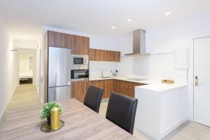 Kuchnia lub aneks kuchenny w obiekcie WintowinRentals Malaga Center, Comfortable and Renovated