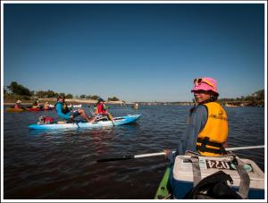 a group of people on kayaks in the water at Solar del Río in Esquina