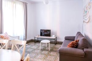 Televízia a/alebo spoločenská miestnosť v ubytovaní Casa Cosi - Sant Gervasi 3