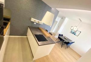 Kuchyň nebo kuchyňský kout v ubytování Style Apartment