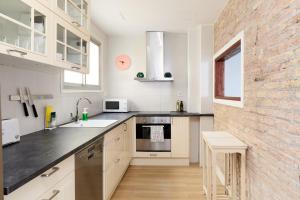 A kitchen or kitchenette at Casa Cosi - Casanova 6