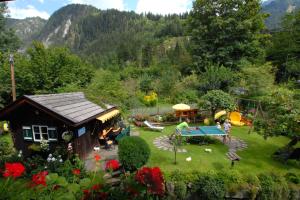 an aerial view of a garden with a house at Haus Tasser in Mayrhofen