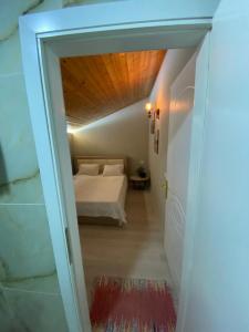Katil atau katil-katil dalam bilik di Villa Elear