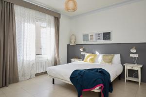 Postel nebo postele na pokoji v ubytování Casa Cosi - Casanova 4