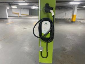 a gas pump is attached to a pole in a parking garage at Holiday Inn Montreal Centre Ville Downtown, an IHG Hotel in Montreal