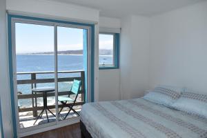 Postelja oz. postelje v sobi nastanitve Bahía Luz Hostal + 37 fotografij