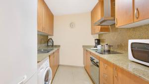 Kuchyň nebo kuchyňský kout v ubytování Apartment StaCris2 - Lloret de Mar