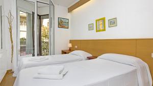 Posteľ alebo postele v izbe v ubytovaní Apartment SPal - Blanes