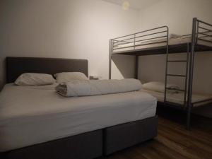Postel nebo postele na pokoji v ubytování Gelijkvloers zeezicht appartement Sterckx