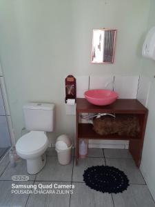 Ein Badezimmer in der Unterkunft Casa Chácara Zulin's,-SIMPLICIDADE E AMOR