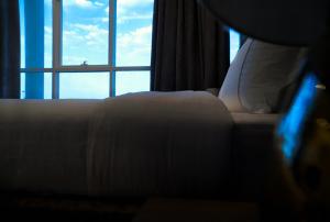 Krevet ili kreveti u jedinici u objektu فندق راديانس جراند
