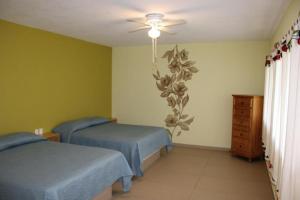 Katil atau katil-katil dalam bilik di Artesanos 11 by Rotamundos