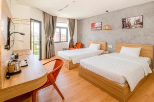 Postel nebo postele na pokoji v ubytování Maya Hotel 3