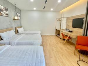 Postel nebo postele na pokoji v ubytování Maya Hotel 3