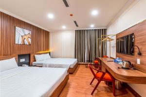 Postel nebo postele na pokoji v ubytování Maya Hotel 3