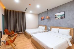 Postel nebo postele na pokoji v ubytování Maya Hotel 3