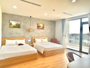 Postel nebo postele na pokoji v ubytování Maya Hotel 3