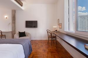 Postel nebo postele na pokoji v ubytování Vossa Bossa Marian