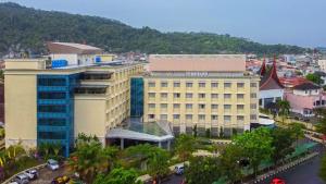 an overhead view of a building in a city at Truntum Padang in Padang