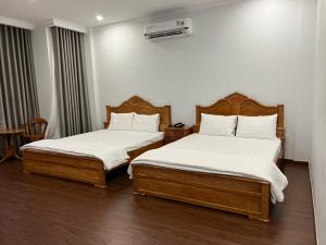 Voodi või voodid majutusasutuse THANH BÌNH HOTEL, Bình Long toas