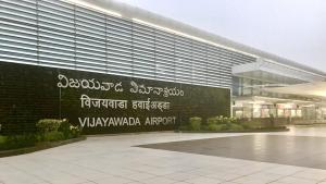 a building with a sign on the side of it at Staro Hotel - Hotel in Vijayawada in Vijayawāda