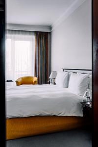 Cama o camas de una habitación en Rahat Palace Hotel