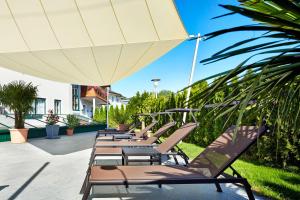 Vonkajšia záhrada v ubytovaní Hotel Gabi