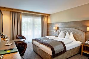 Posteľ alebo postele v izbe v ubytovaní Hotel Gabi