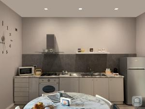 A kitchen or kitchenette at Borgo Antignano