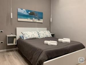 A bed or beds in a room at Borgo Antignano