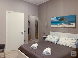 A bed or beds in a room at Borgo Antignano